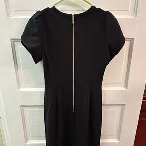 Calvin Klein sheath dress. Size 4. Black. Overlap cap sleeves.